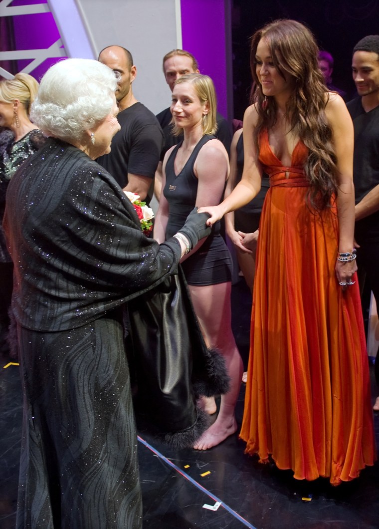 Image: Britain's Queen Elizabeth meets U.S. singer Miley Cyrus after the Royal Variety Performance in Blackpool